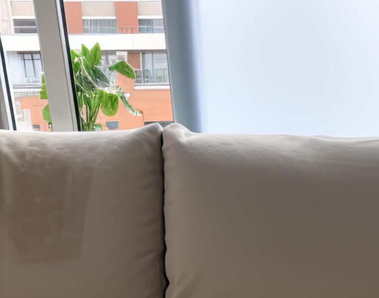 Before and after the sofa is cleaned thoroughly using a device.